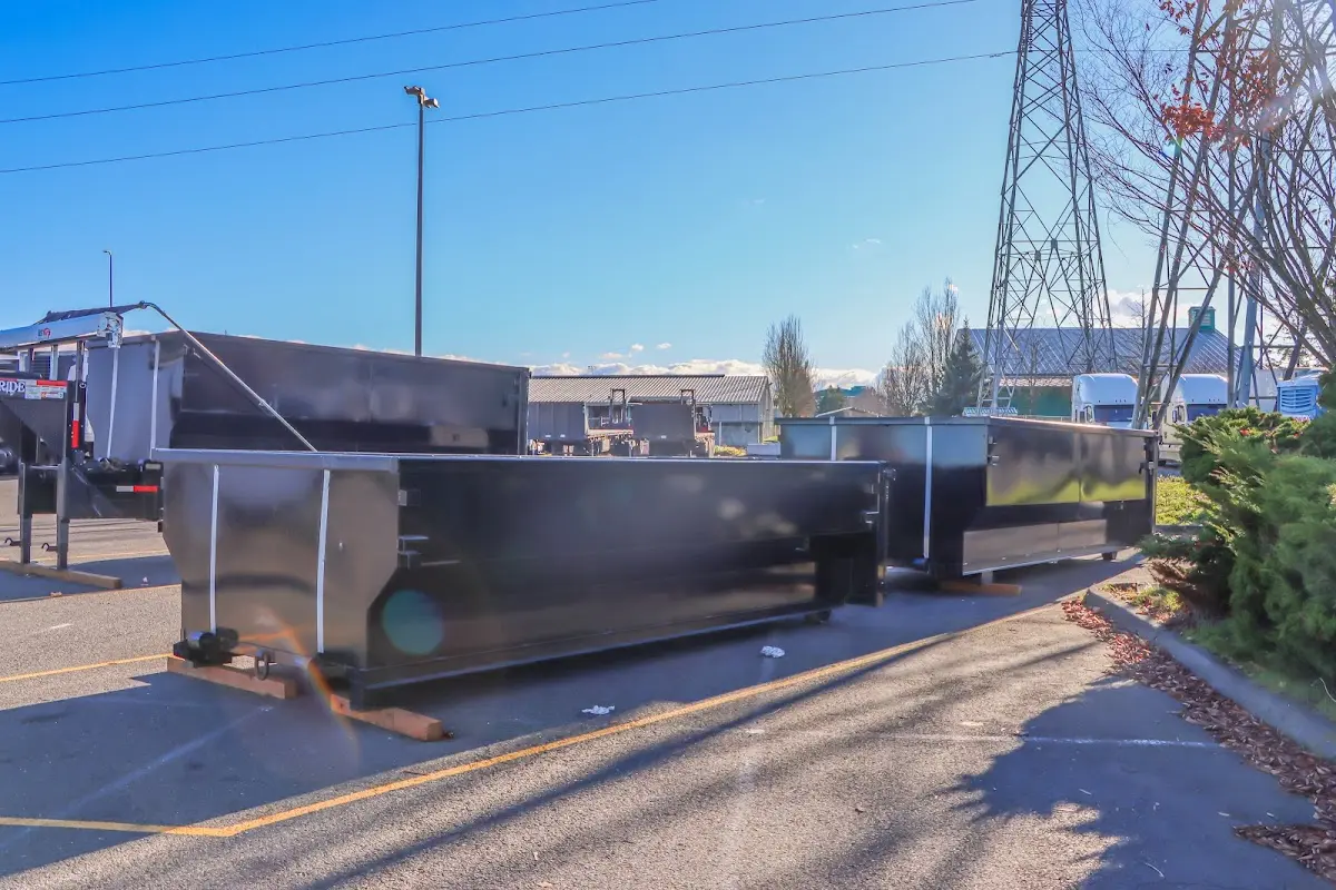 Roll-off dumpster ready for waste disposal at job site for Estate Cleanout Dumpster Rental in Bastrop